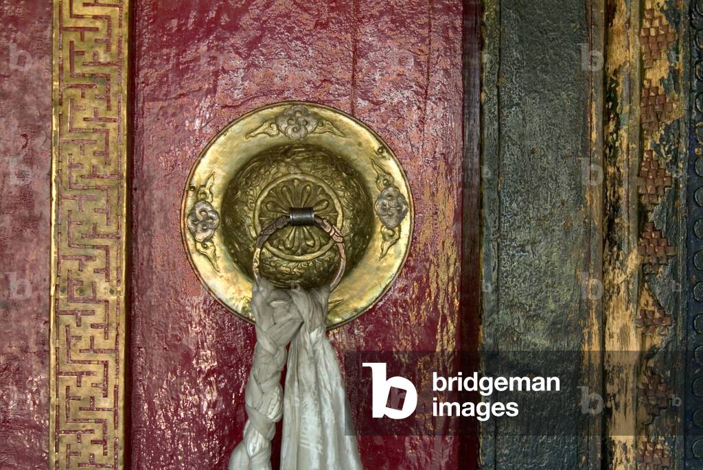 Ornate detail of main temple door in Buddhist monastery (Tibetan Buddhism, Gelugpa order) Sankar Gompa, Leh, Ladakh, Himalayas, Jammu and Kashmir, India (photo)