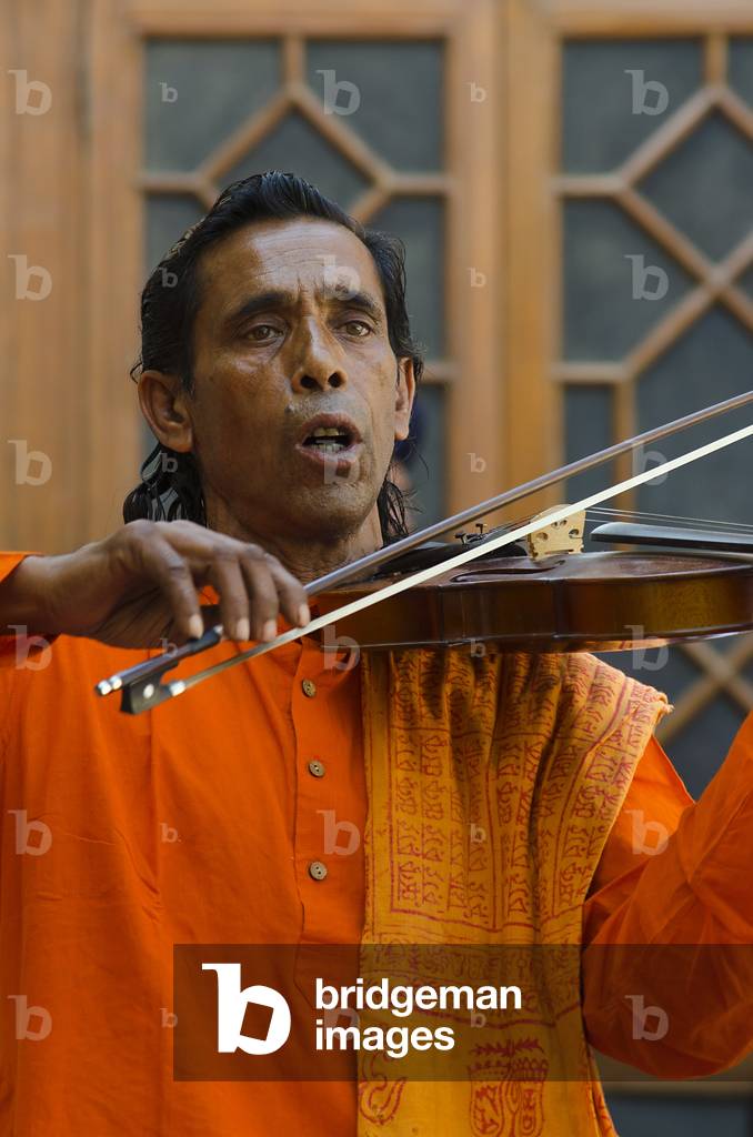 Violinist & singer performing at the World Sufi Spirit Festival 2014,
Mehrangarh Fort, Jodhpur, Rajasthan, India (photo)