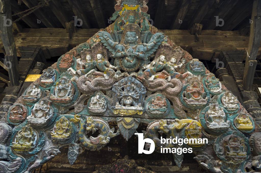 Bagh Bhairav Temple: Detail of intricately carved wooden Torana arch (15/16th century), Kirtipur, Kathmandu Valley, Nepal (photo)
