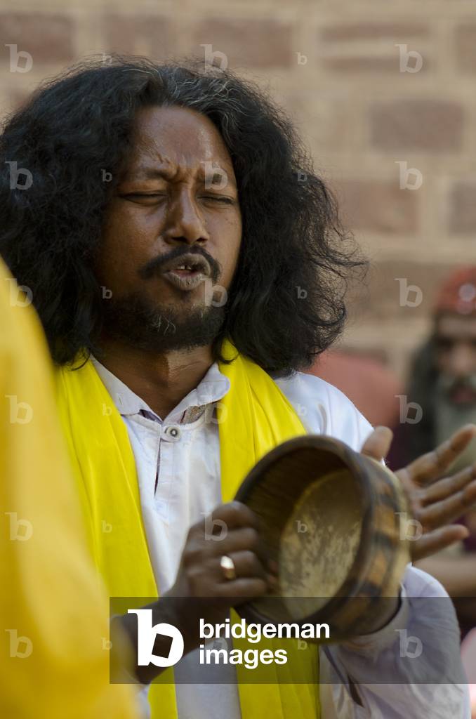 Singer & small hand drum player performing at the World Sufi Spirit Festival 2014,
Mehrangarh Fort, Jodhpur, Rajasthan, India (photo)