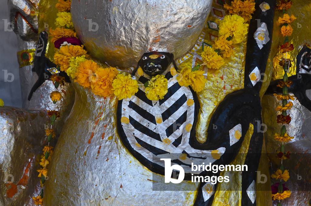 Hinduism: Cobra painted on potbelly of Ganesh statue,
Jodhpur, Rajasthan, India (photo)
