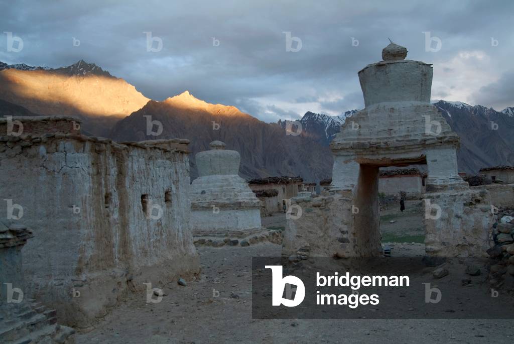 Himalayan Landscape: Buddhist arched Chorten (Stupa) entrance to remote village in last light, Pishu, Zanskar River Valley, Zanskar (Ladakh), India (photo)