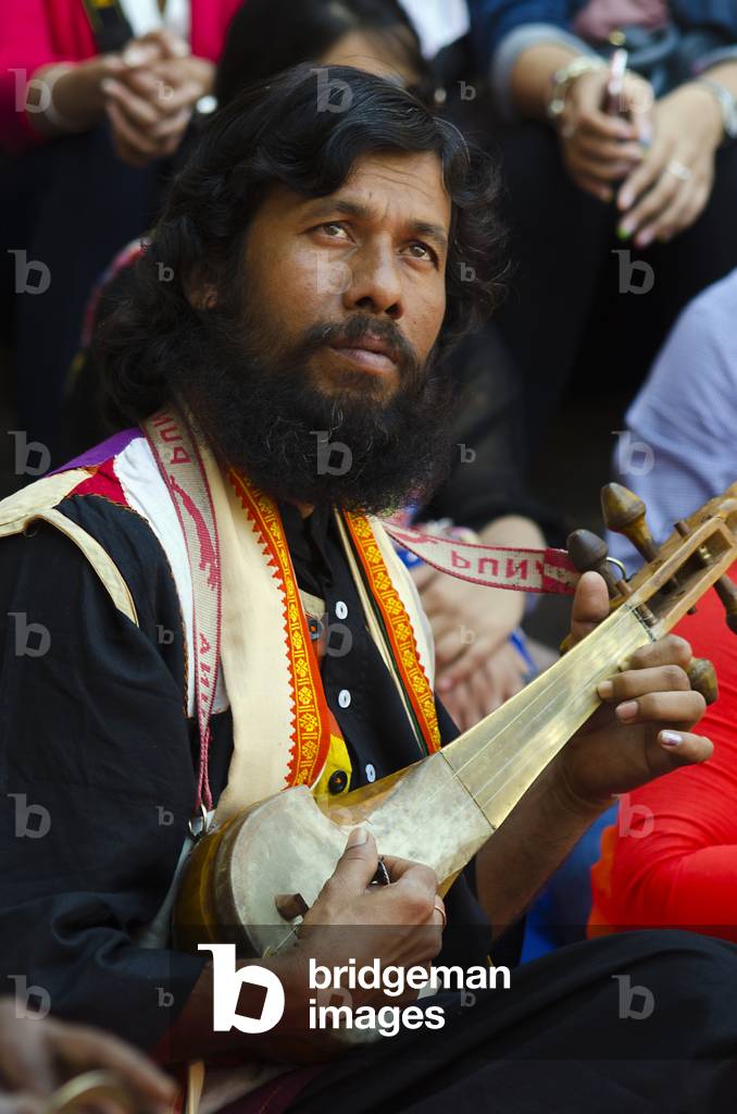 Dotara player performing at the World Sufi Spirit Festival 2014,
Mehrangarh Fort, Jodhpur, Rajasthan, India (photo)