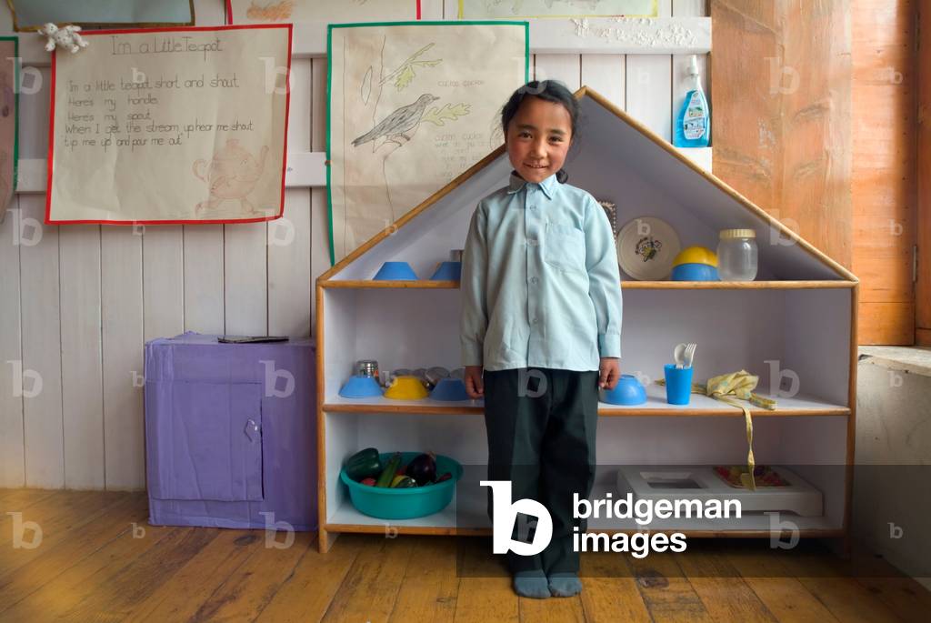A Ladakhi schoolgirl in her classroom, Shey, Ladakh, India (photo)