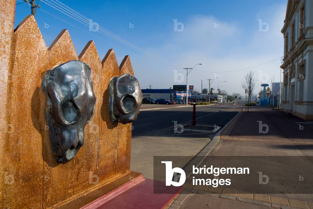 Memorial sculpture on main street to eccentric town veterinarian 
