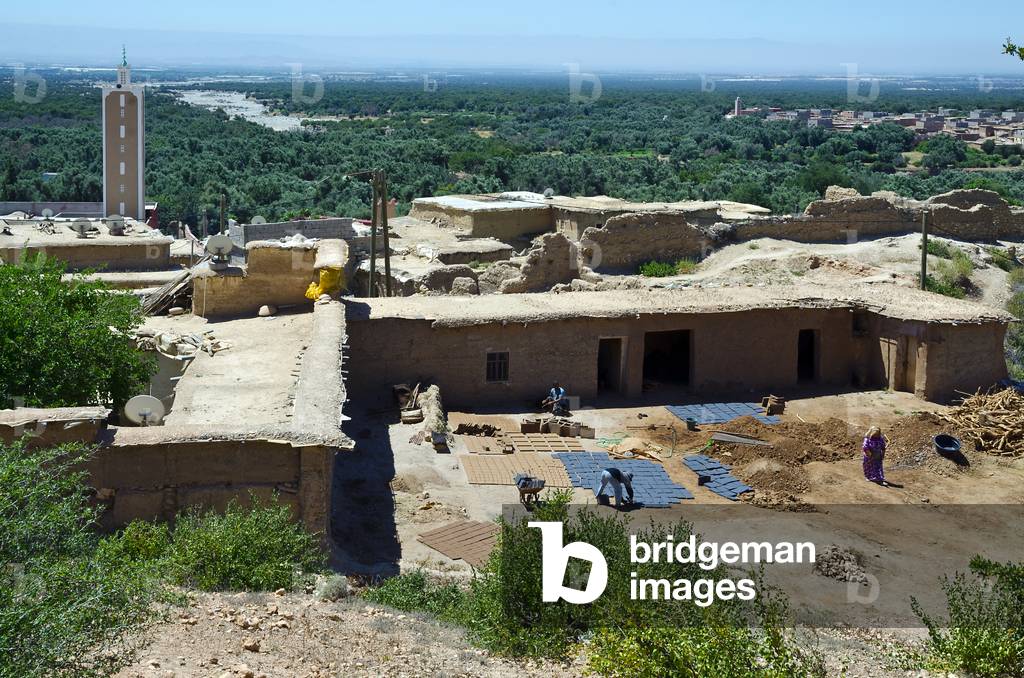 Berber  village pottery  overlooking vast river plain with olive groves, Riad, Taroudant Province, Souss-Massa-Draa Region, Morocco (photo)