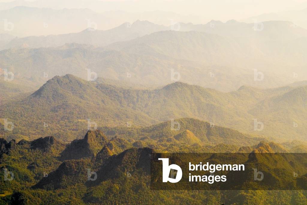 Aerial view of pristine tropical montane rainforest covering central highlands east of Vang Vieng,
Laos, Indochina, Southeast Asia
MUCH NOISE IN IMAGE