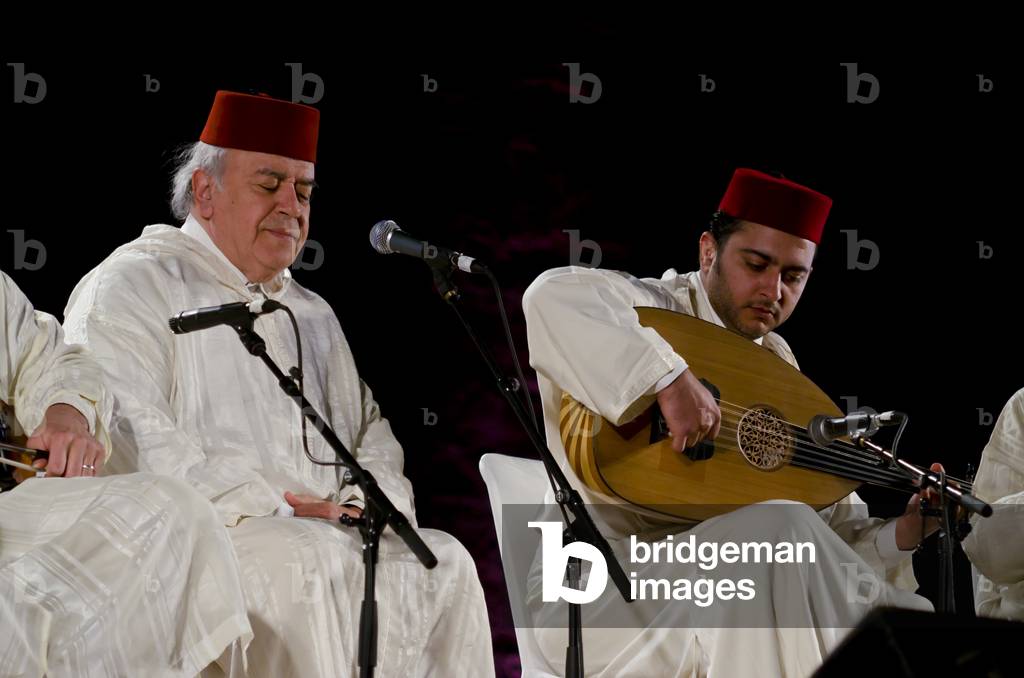 Moroccan singer & oud player in the Chabab Al Ensemble performing Arabic Andalusian music at the World Sufi Spirit Festival 2014,
Mehrangarh Fort, Jodhpur, Rajasthan, India (photo)