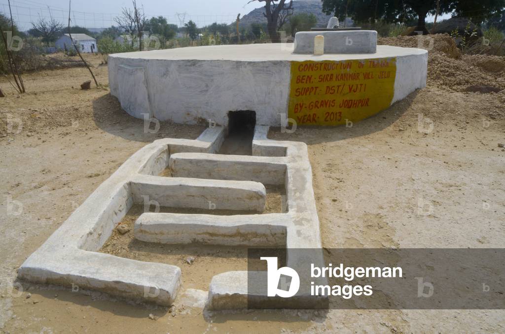 Rainwater harvesting: Underground drinking water storage tank with silt catcher at the inlet in desert hamlet,
nr. Jeloo village, Rajasthan, India