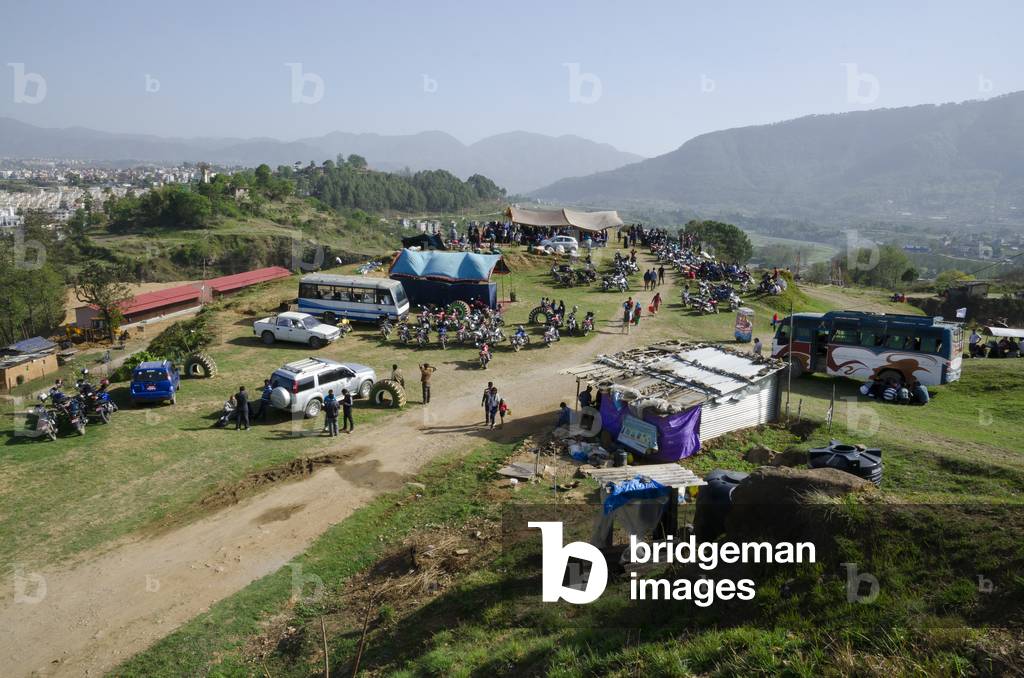 Nepali families gathering at weekend picnic spot on hill outside Kathmandu overlooking Chobar Gorge, 
Chobar, Kathmandu Valley, Nepal (photo)