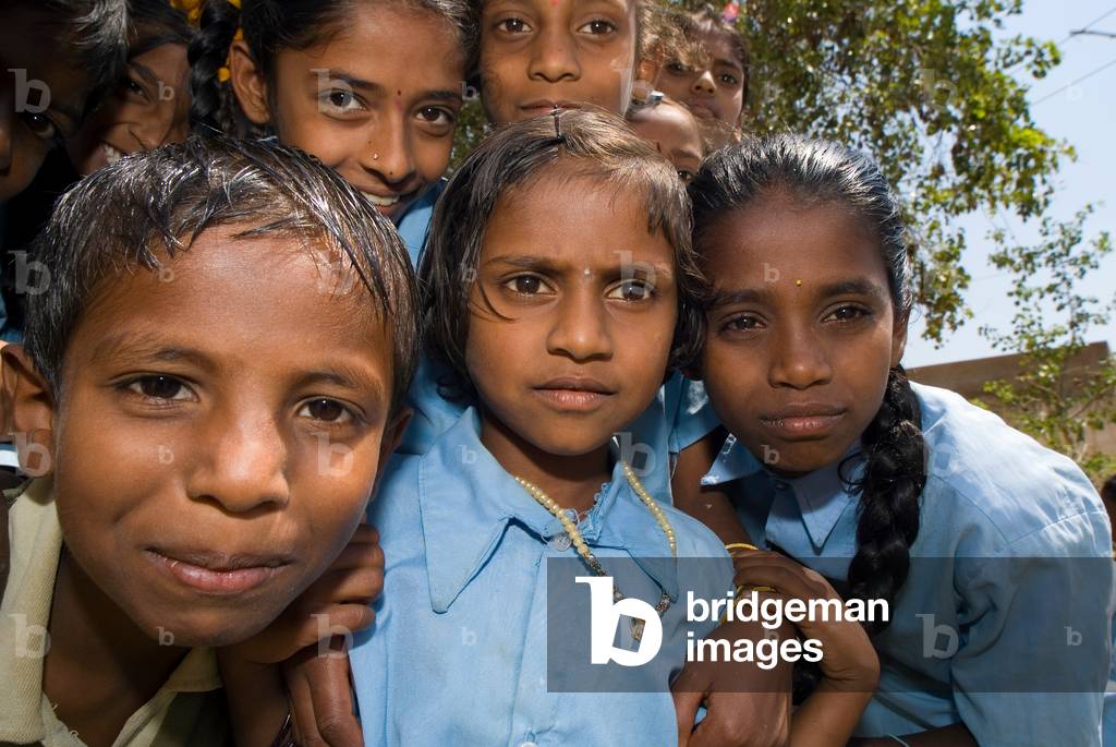 Group of inquisitive village children (photo)