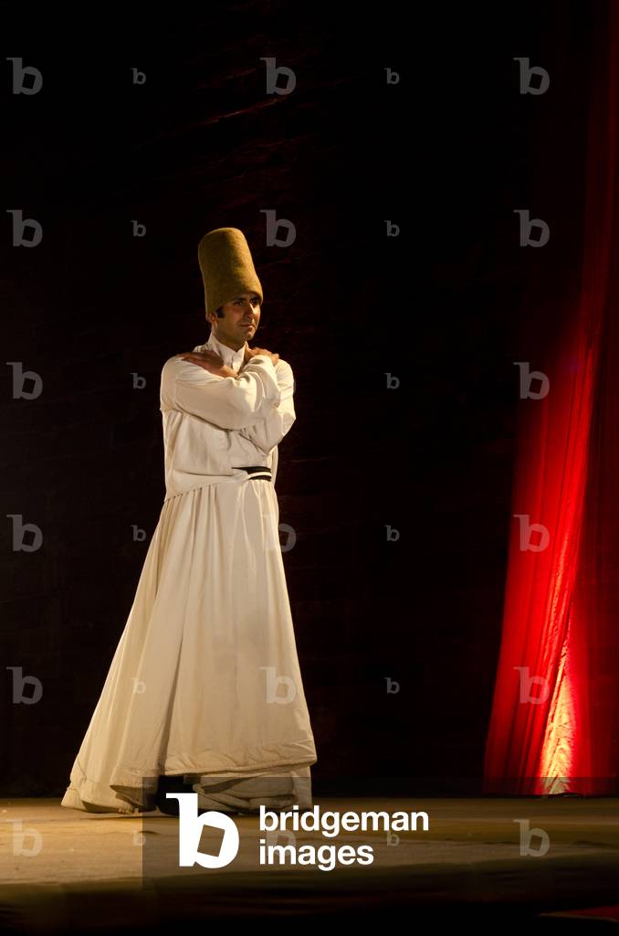 Sufi whirling dervish performing at the World Sufi Spirit Festival 2014,
Mehrangarh Fort, Jodhpur, Rajasthan, India (photo)
