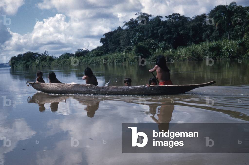 Noanamá people in a canoe, San Juan River, Chocó department, Colombia, 1960-61 (photo)