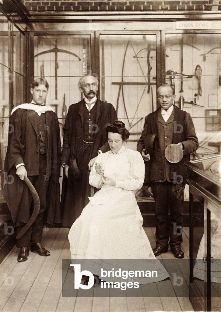 The first Diploma students in Anthropology with curator Henry Balfour at the Pitt Rivers Museum, Oxford, 1908 (b/w photo)