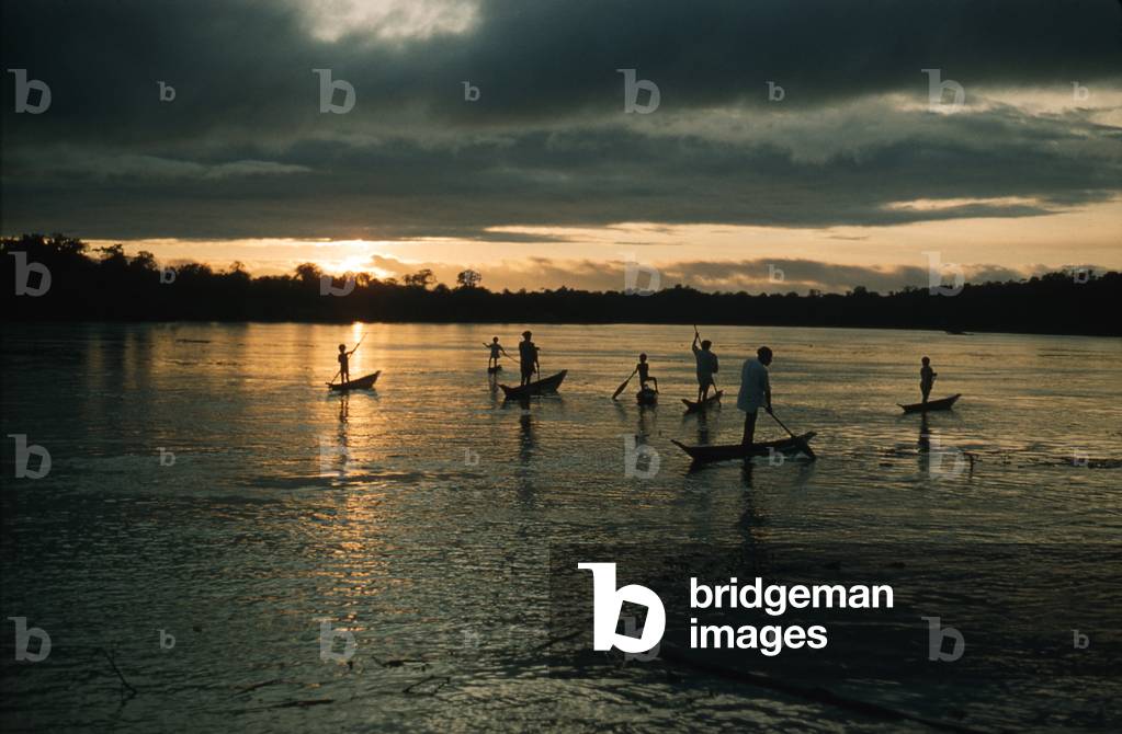 Canoes on the river at sunset, Chocó department, Colombia, 1960-61 (photo)