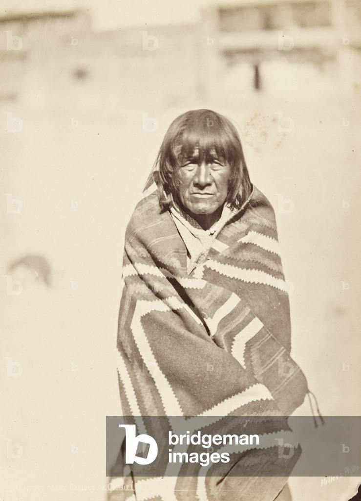 Portrait of Francisco Areso, from Cochiti pueblo, wrapped in a striped blanket, c.1879-80 (albumen print)