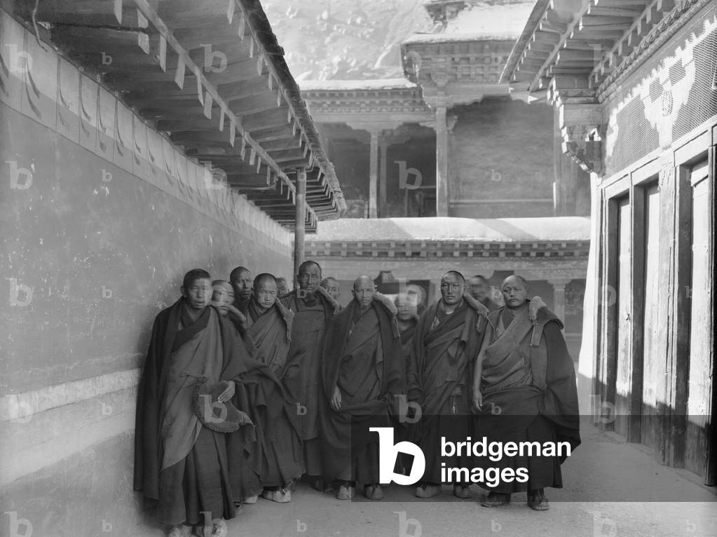 Abbots of Sera monastery standing with hats on shoulders or held in hand, c.1920-21 (glass plate gelatin print)