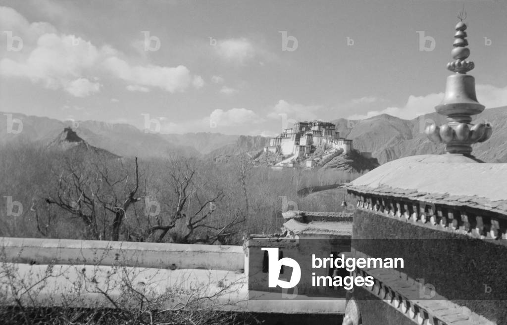Potala as seen from roof of Kundeling Monastery, Central Lhasa, Tibet, 1936 (b/w photo)