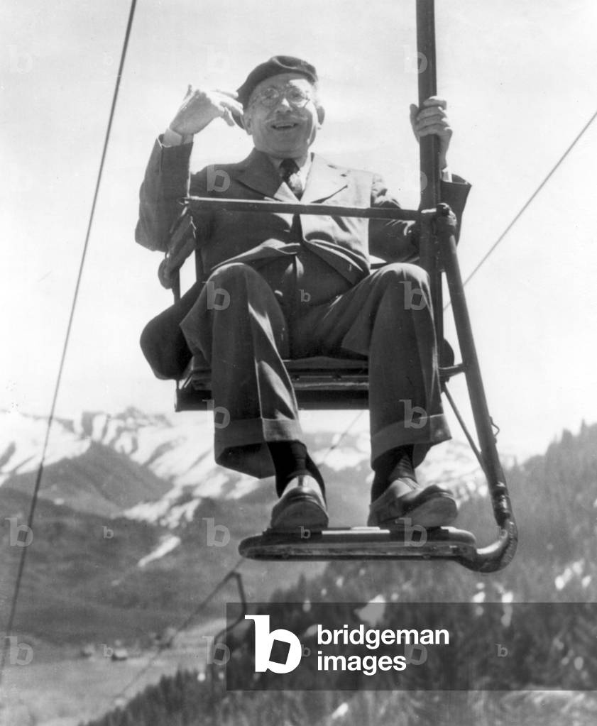 Arturo Toscanini ( 1867 - 1957 ), Italian conductor taking ski lift up Bald mountain Sun Valley Idaho 13th May 1950