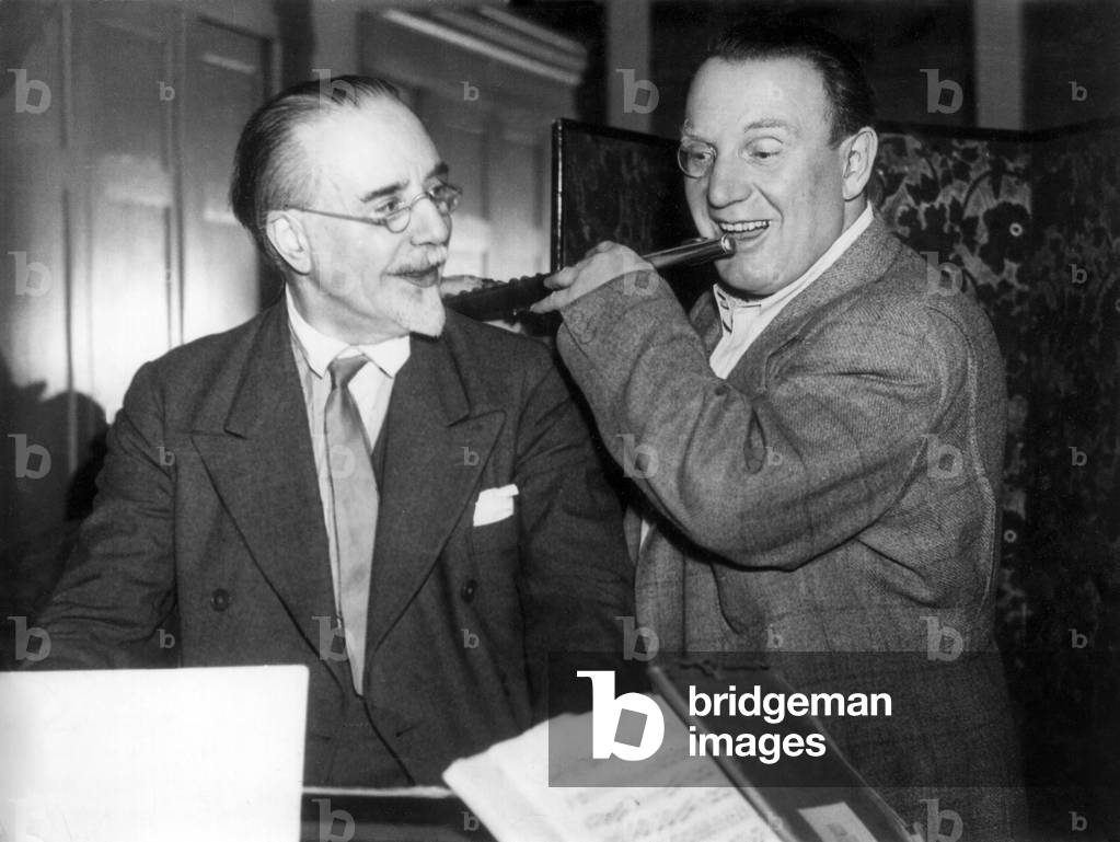 Sir Thomas Beecham, English conductor, and Richard Tauber, Austrian tenor rehearsing for The Magic Flute, April 1938