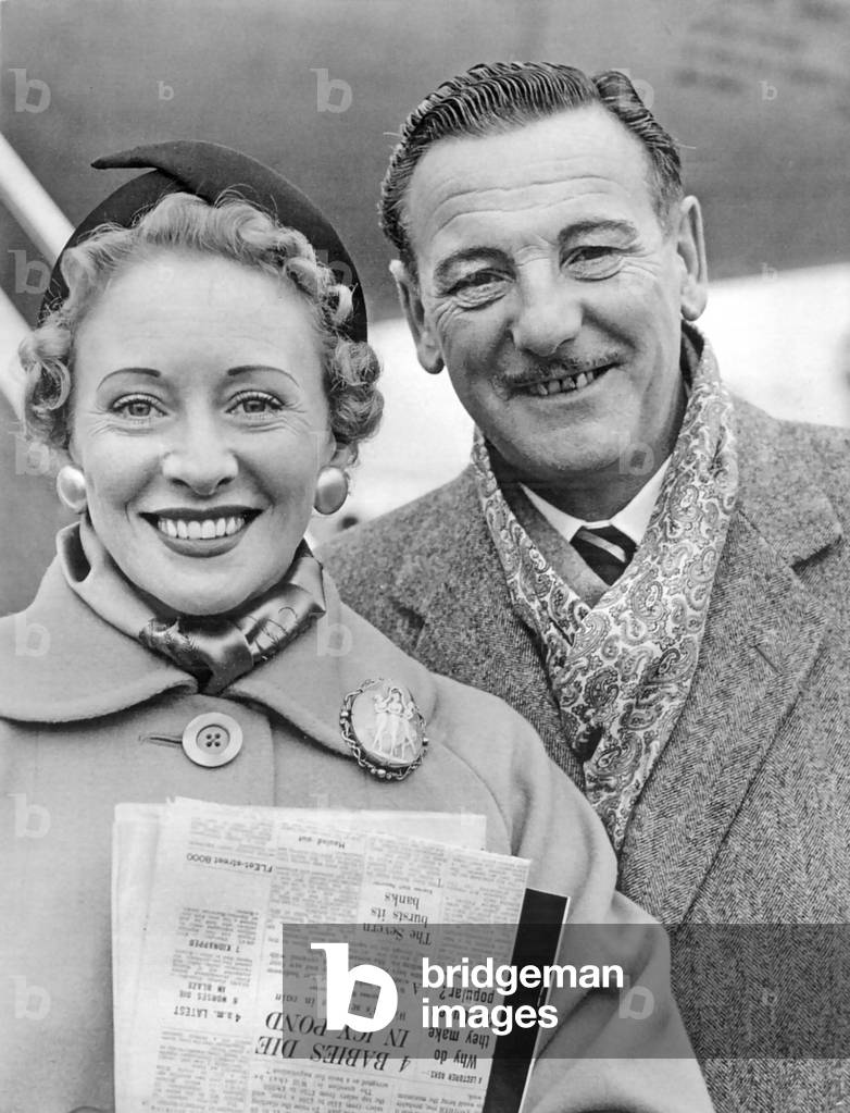 Anne Ziegler, English soprano, and Webster Booth, English tenor, at London airport 1955