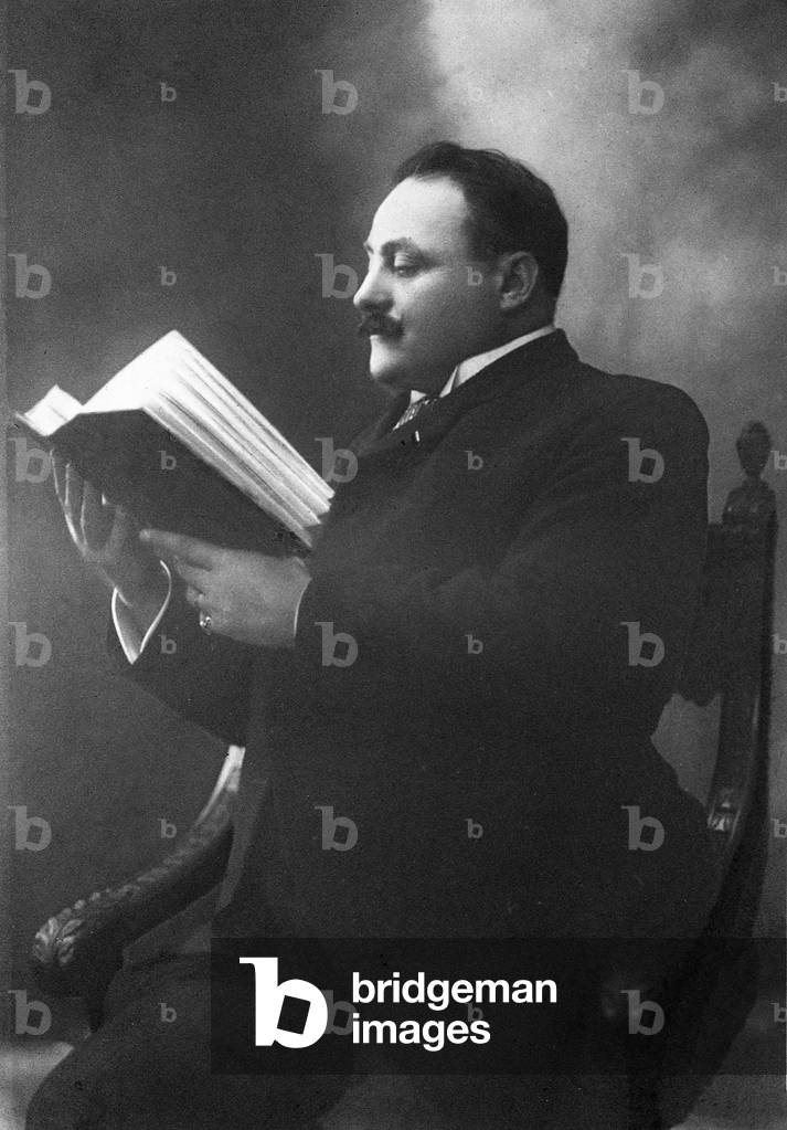 Emile Scaramberg. Portrait photograph of the singer holding a vocal score. French operatic tenor, 1863-1938.