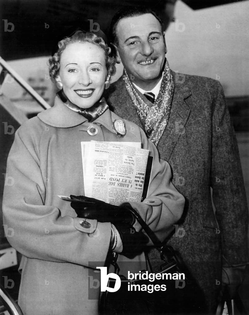 Anne Ziegler, English soprano, and Webster Booth, English tenor, at London Airport 1955