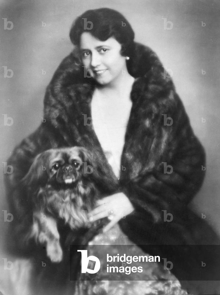 Elisabeth Schumann with dog, Sorry, 1931. German soprano: 13 June 1888 - 23 April 1952.