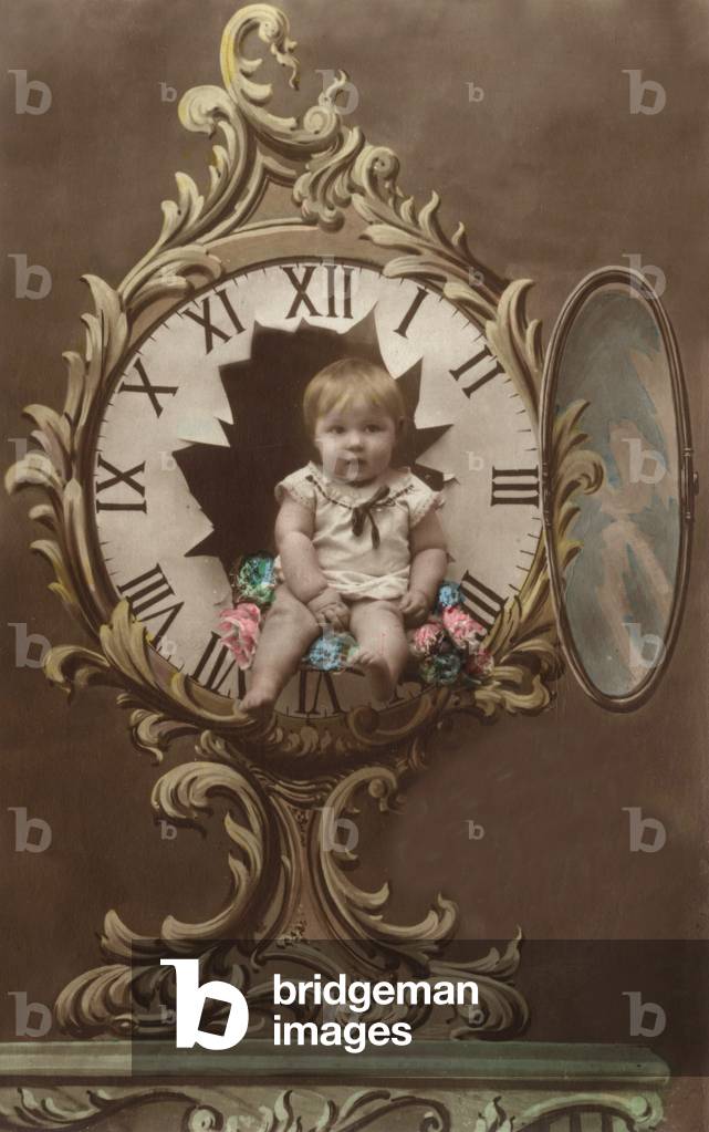 New year Postcard with a child in a clock, c. 1910