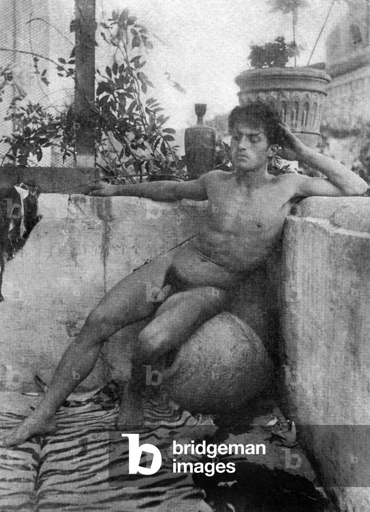 In Taormina, Sicily, naked young man, photo by german gay photograph Wilhelm von Gloeden (1856-1931) c. 1900