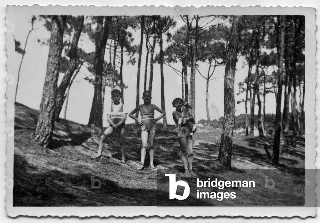 Children (Freton family, Jeannine with the dog) during holidays, France, 1936