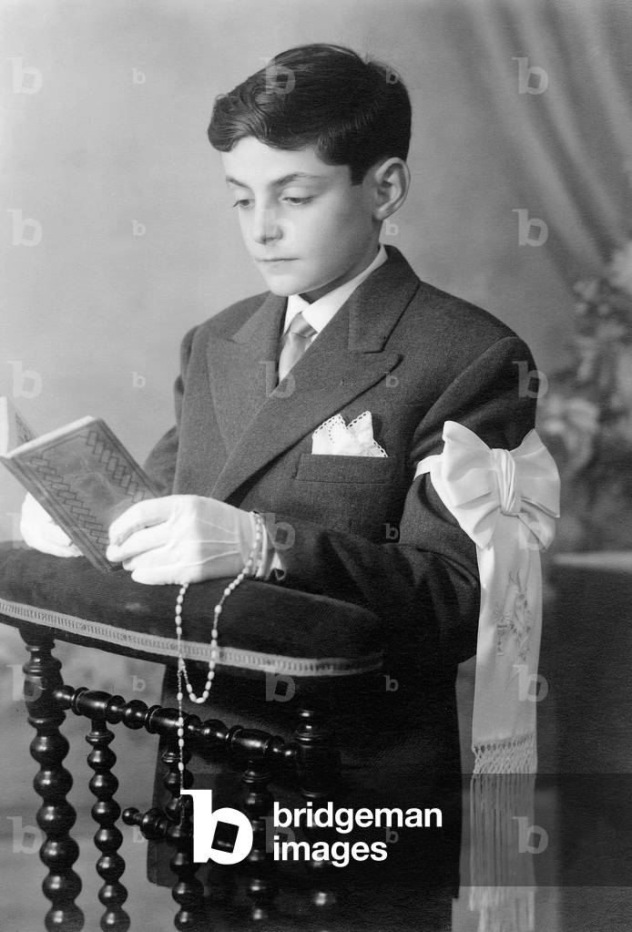 Young boy during his first communion c. 1946 (photo)