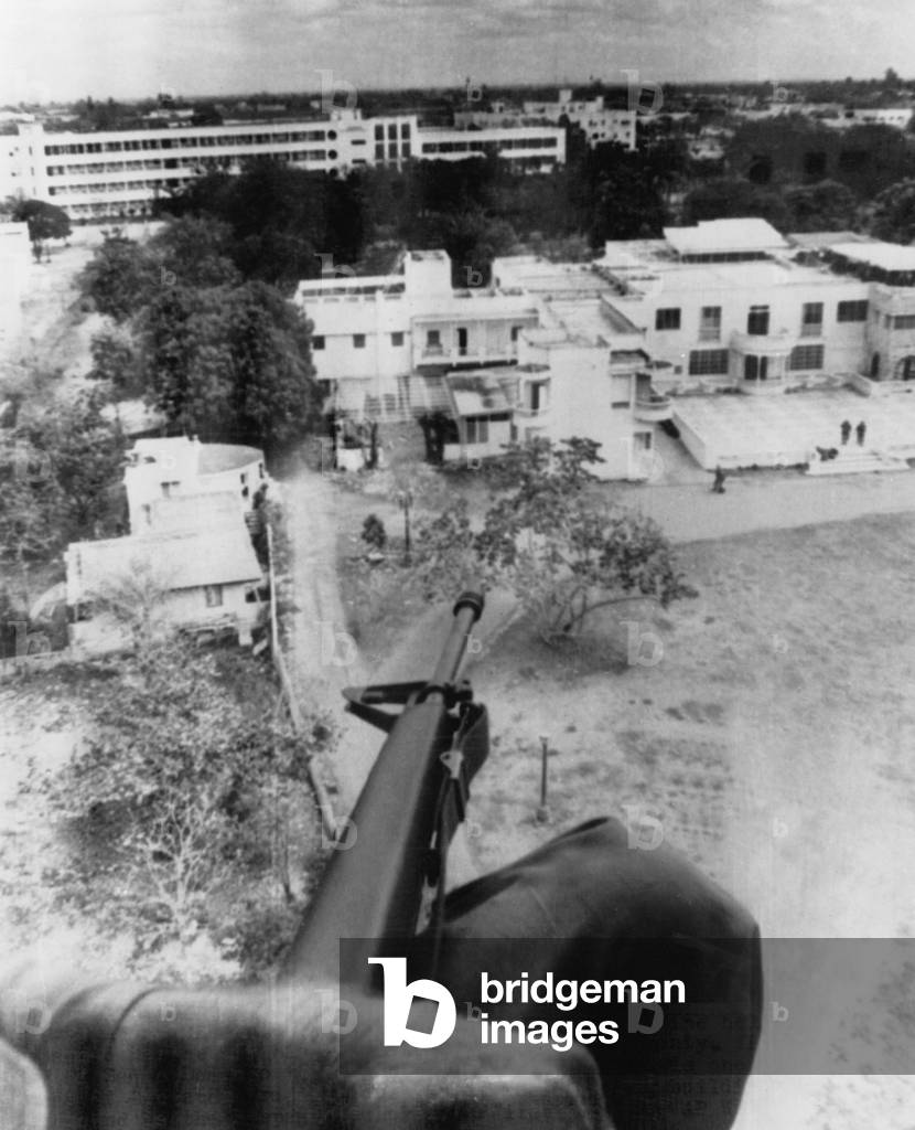 The Organization of American States troops checking over a revolt, Santo Domingi, 1965 (b/w photo)