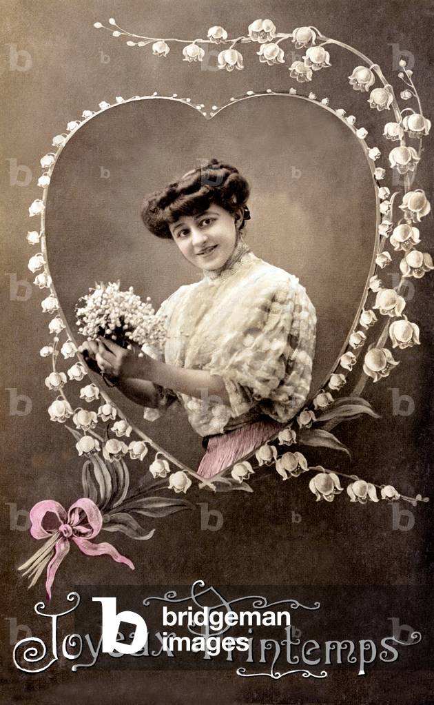 Woman with some lily of the valley, 1900-1920 (postcard)