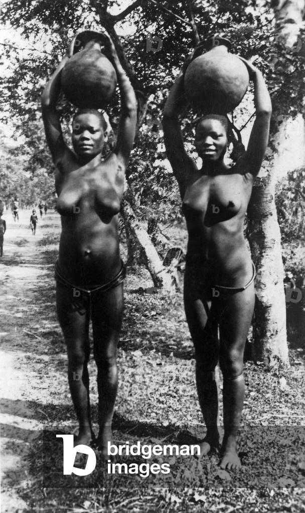 Girls Hausa, Nigeria carry water, 1955 (photo)