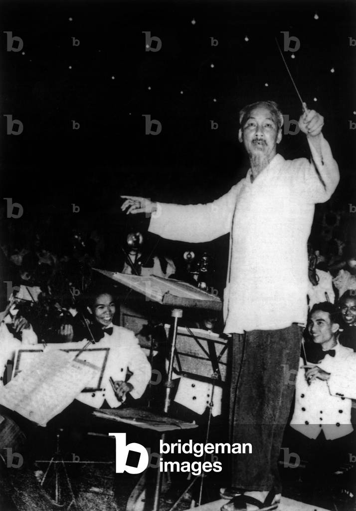 Ho Chi Minh (1890-1969), founder of Indochinese communist party, then from1945 president of democratic republic of Vietnam here c. 1962 conducting an orchestra