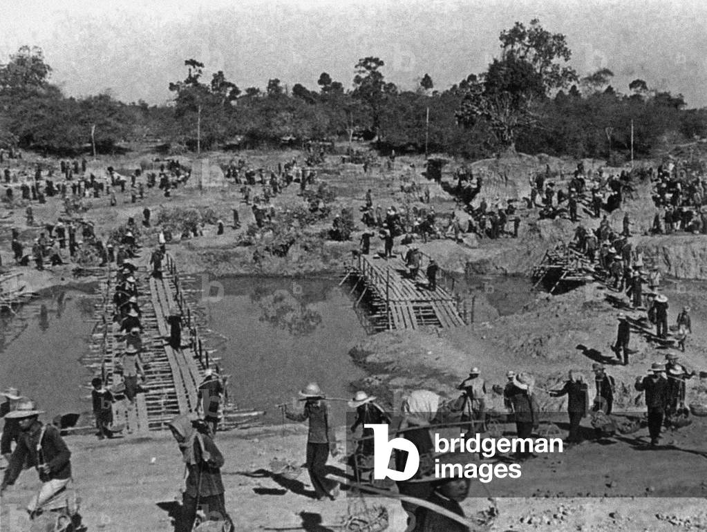 Cambodians working on an irrigation project. Dam 