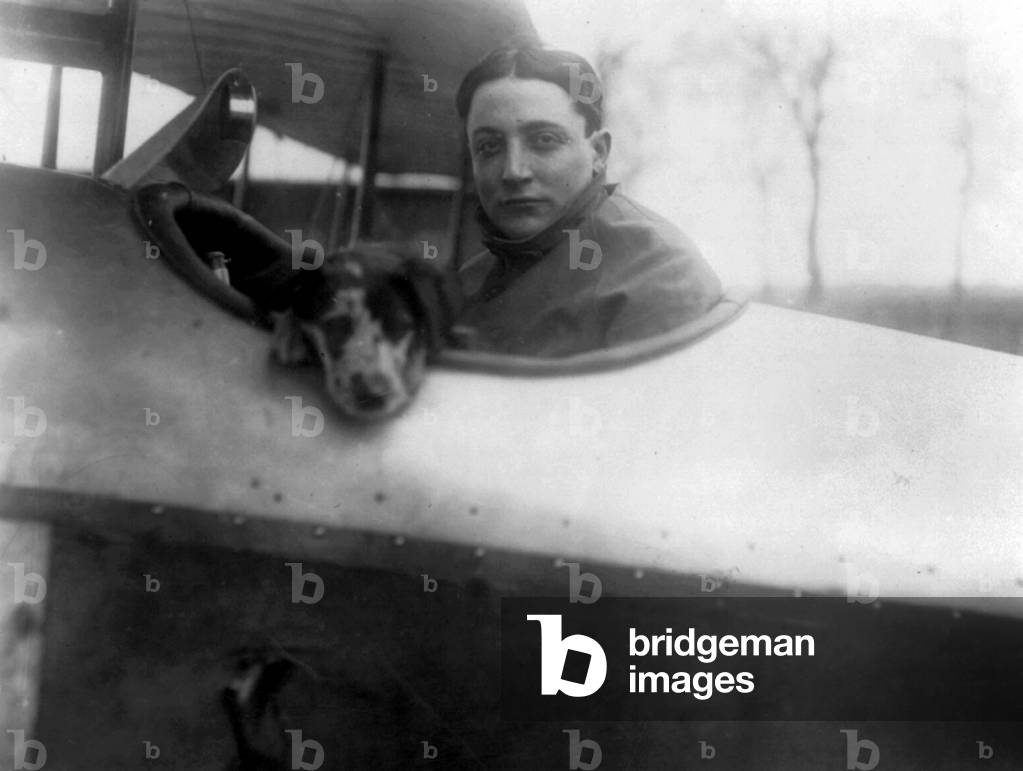 Victor Garaix (1890-1914) french pilot, here in a plane with a dog, 1914