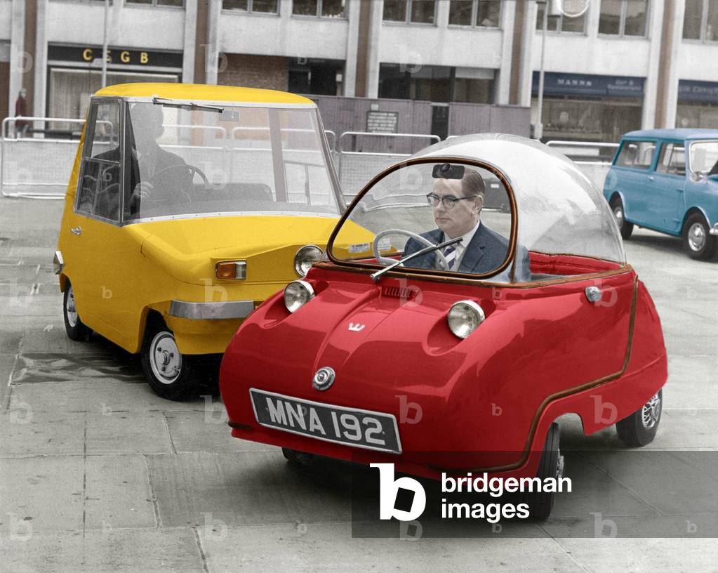 Two electrically driven cars in London march 21, 1966
