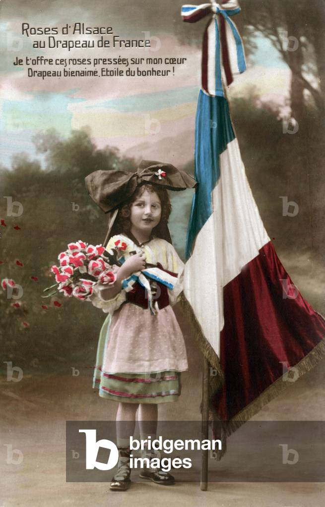 Little girl with alsatian costum near french flag, Postcard, 1916