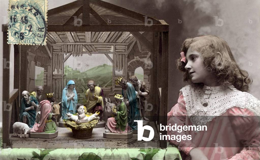 Greeting card for Christmas: young woman looking at a crib, 1906