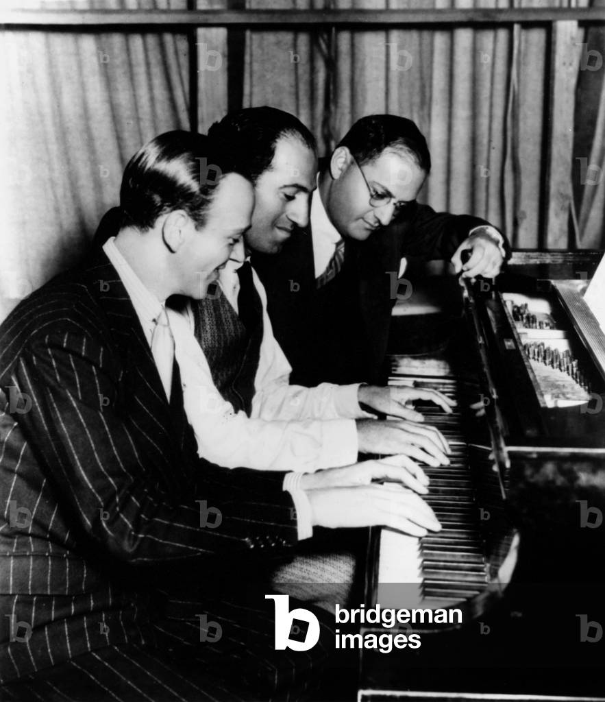George Gershwin at piano with Ira Gershwin & Fred Astaire (photo)