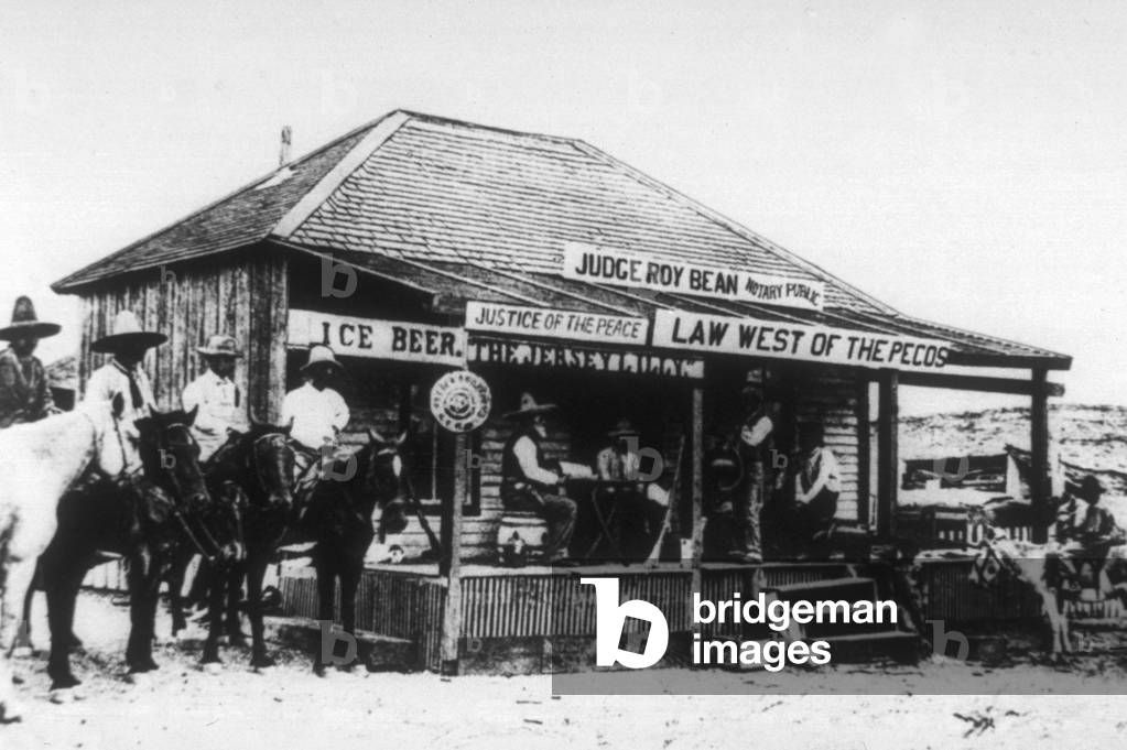 Judge Roy Bean and his courthouse in a saloon in Texas c. 1870 (b/w photo)