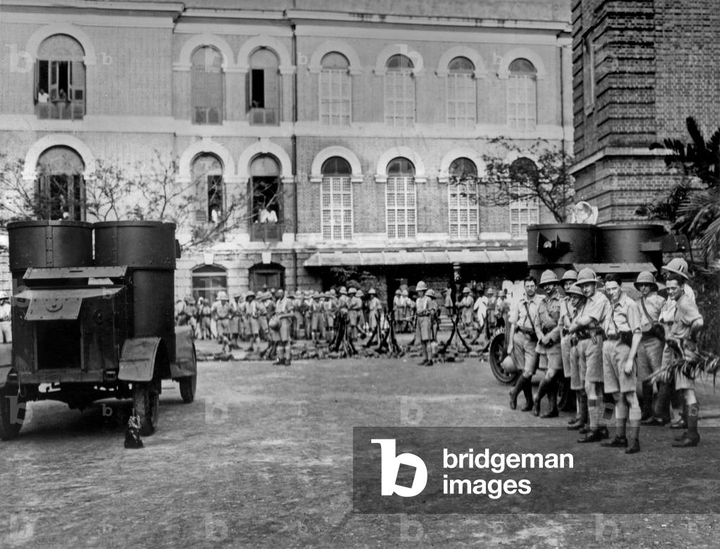 The Calcutta Riots on april 26, 1926 between Hindu and Muslims: armoured cars, regulars and auxiliary forces at police headquarters in the Lall Bazaar ready to cope with fresh trouble