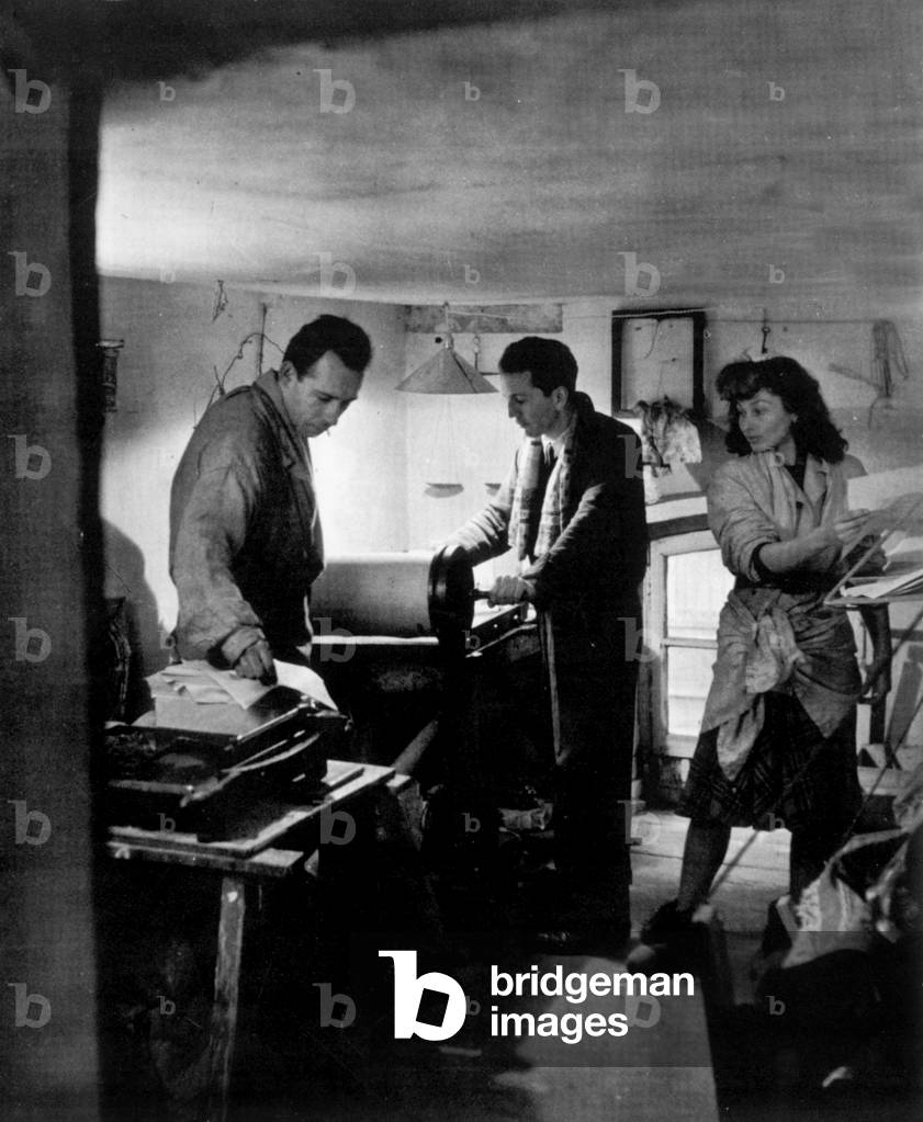 Clandestine printing operating for the movement of national liberation with his wife and a painter friend Philibert (left) in the opera district in Paris c.1941