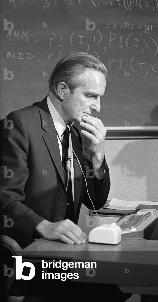 Douglas C. Engelbart, american engineer, inventor of the computer mouse in 1963, here at presentation of prototype on december 9, 1968