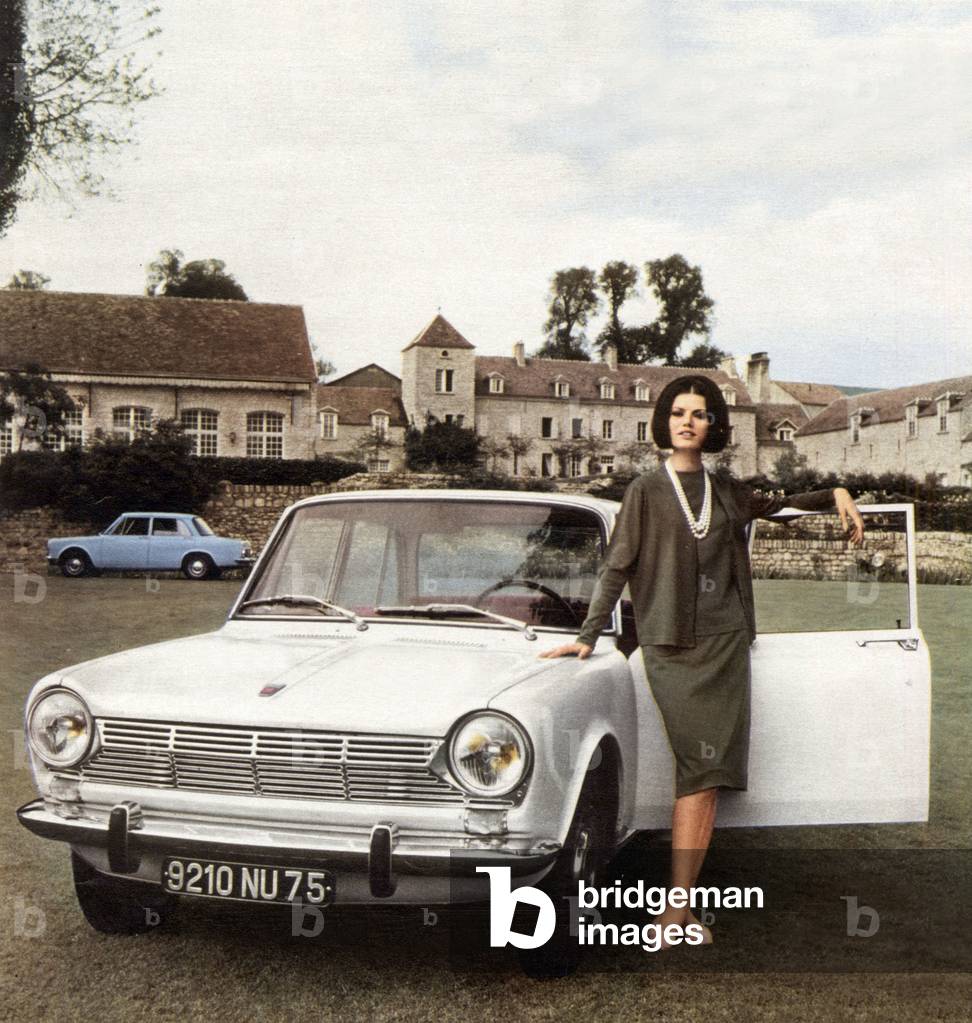 Simca 1300 car with young woman wearing Minos pull over, Mikonos cardigan and Milo skirt, 1963