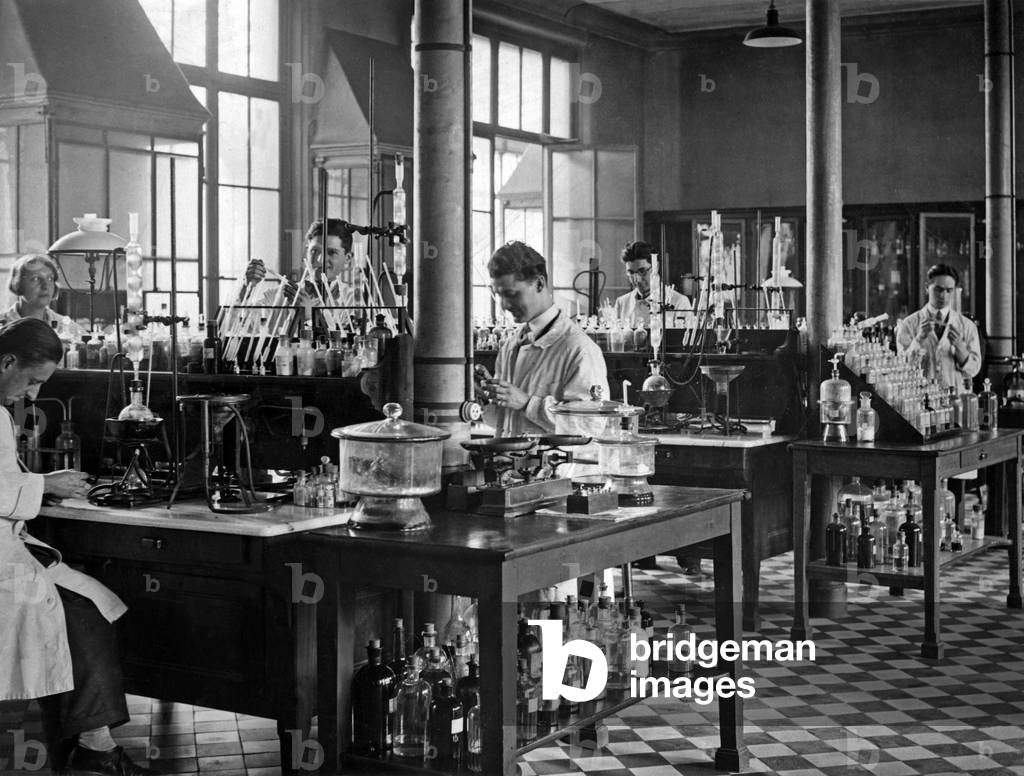 Scientists working in a laboratory at Pasteur Institute in Paris, 30's