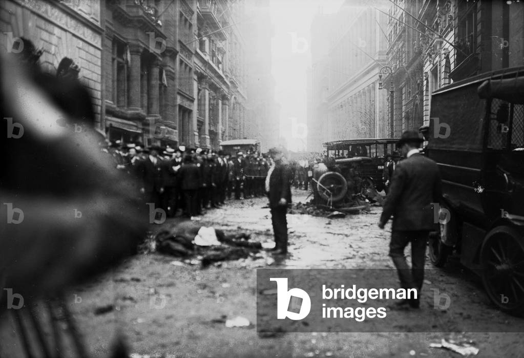 Anarchist bombings , New York : Wall Street explosion. Automobile lying on its side in foreground, september 16, 1920