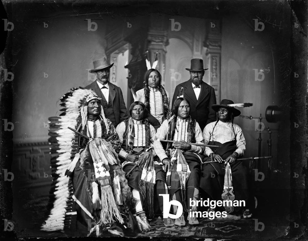 Group of Indian Sioux in 1877 in Washington to meet american president: standing: Joe Merrivale (Interpreter), Spotted Tail, Jr. (Sicangu), Antoine Janis ; seated: Touch the Clouds, Sharp Nose (Arapaho), Black Coal (Arapaho), Friday (Arapaho)